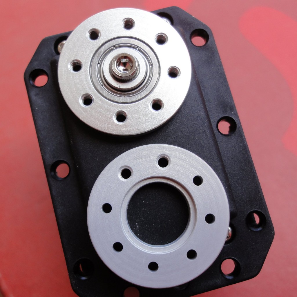 Anodized Aluminum 6061 on top, Aluminum 2011 prototype on bottom